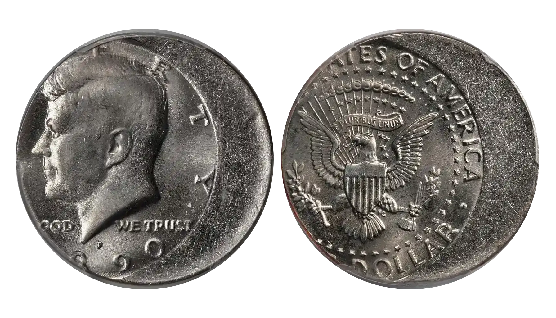 1990 Kennedy Half Dollar off-center strike error showing design shifted off center with blank planchet crescent